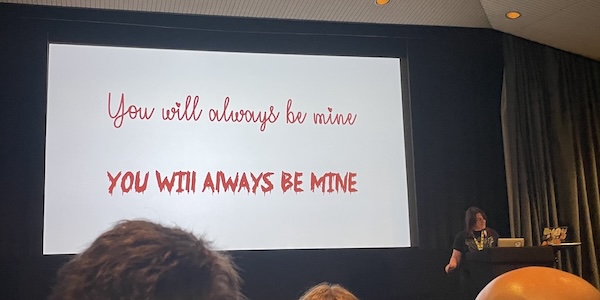 You will always be mine' is written twice: first in a cutesy cursive font and then in a creepy, all-caps horror font.